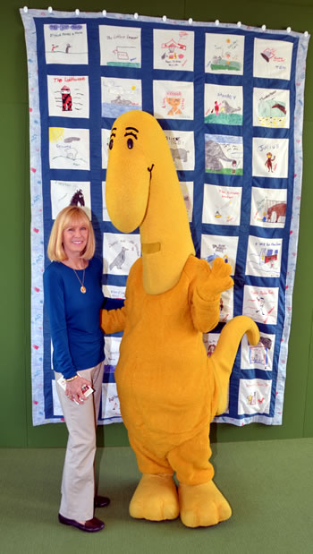 Calrol Edmonston with Danny The Dinosaur at The Newport Beach Public Library Exhibit